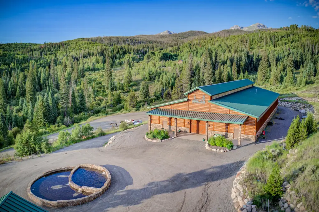 Nestled on 250 private acres, the Triple Creek Ranch estate...