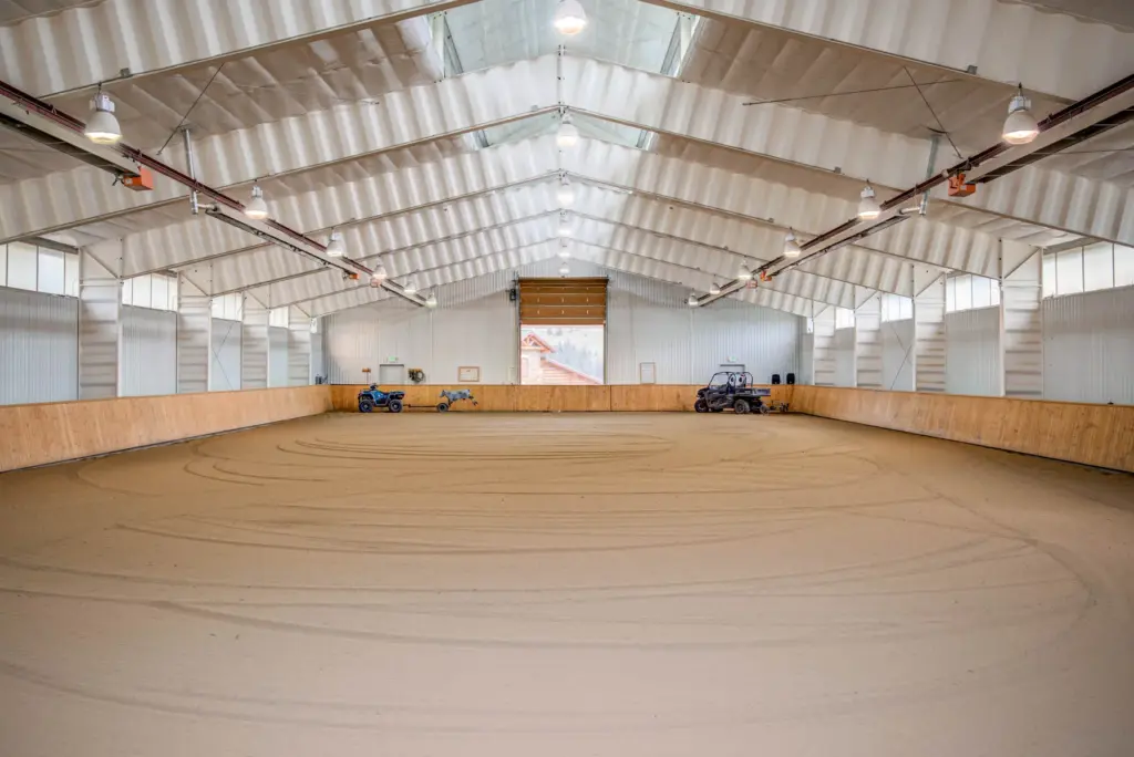 An interior image of Triple Creek Ranchâs equestrian facilities near...