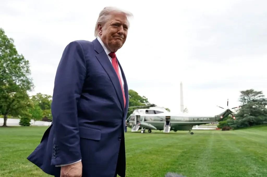 President Donald Trump speaks to reporters as he walks to board Marine One.