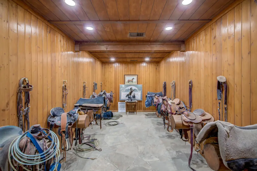 An interior image of Triple Creek Ranchâs equestrian facilities near...