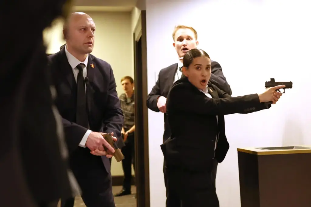 FILE – Secret service agents respond when a man, who...