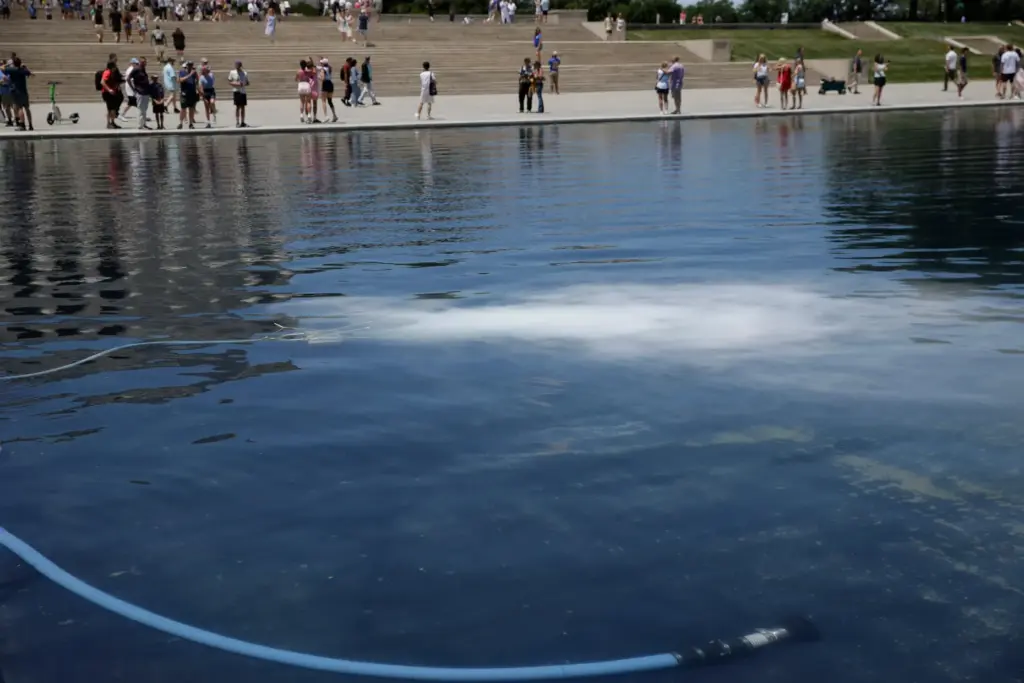 A white substance is pumped into the Lincoln Memorial Reflecting...