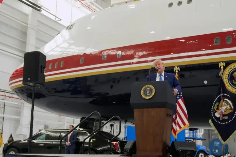 President Donald Trump unveils the new Air Force One, a converted Qatari jet