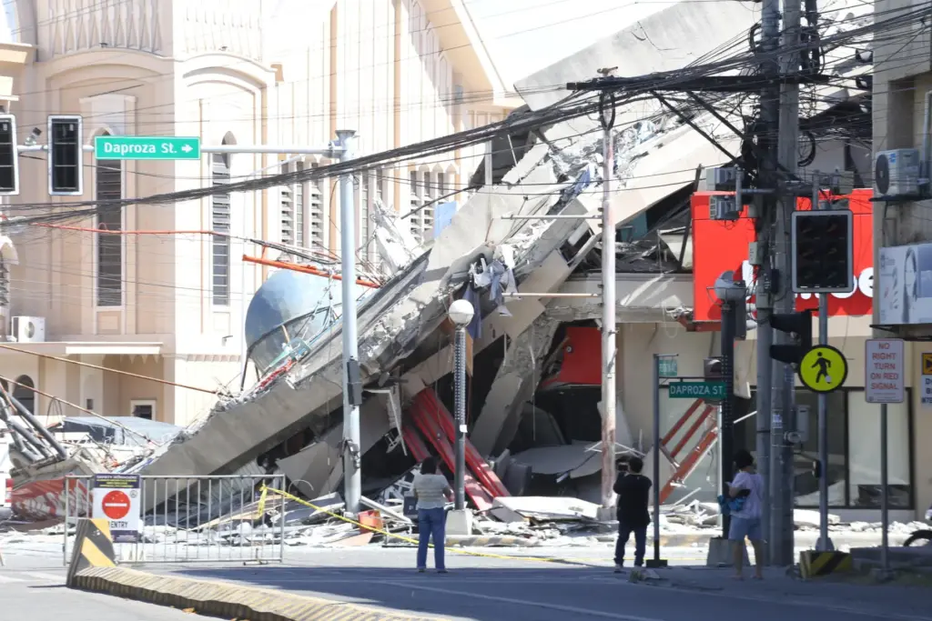 A building is damaged after an earthquake in General Santos,...