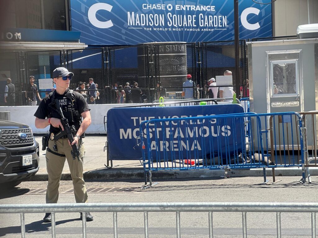 A Secret Service agent stands watch outside Madison Square Garden...