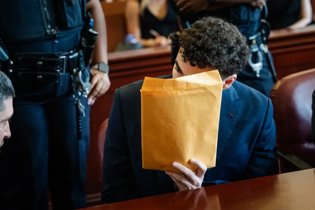 Luigi Mangione appears for a pre-trial hearing at Manhattan Criminal Court.