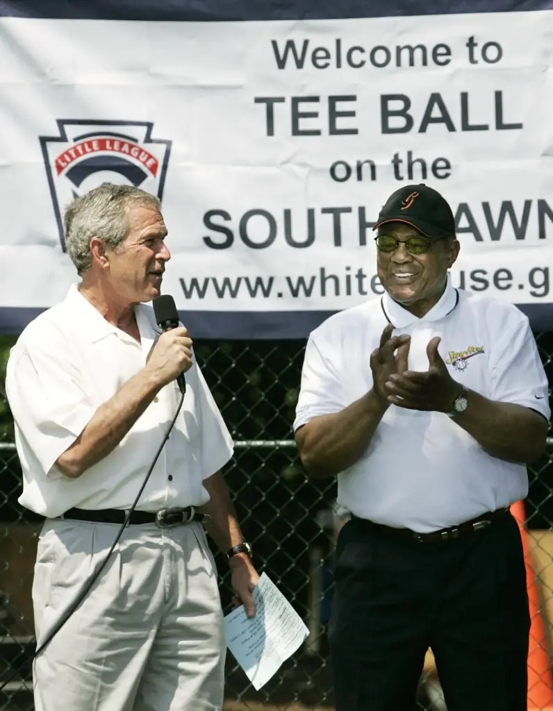 FILE – President George W. Bush, left, and National Baseball...