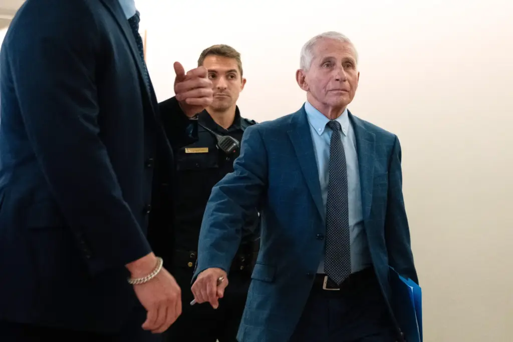 Dr. Anthony Fauci departs after appearing before the Senate Homeland Security and Governmental Affairs Committee.