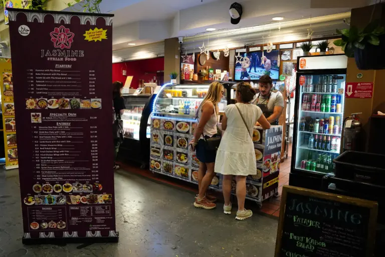 Mango House’s refugee food stalls are thriving with Haitian, Syrian and Burmese cuisine