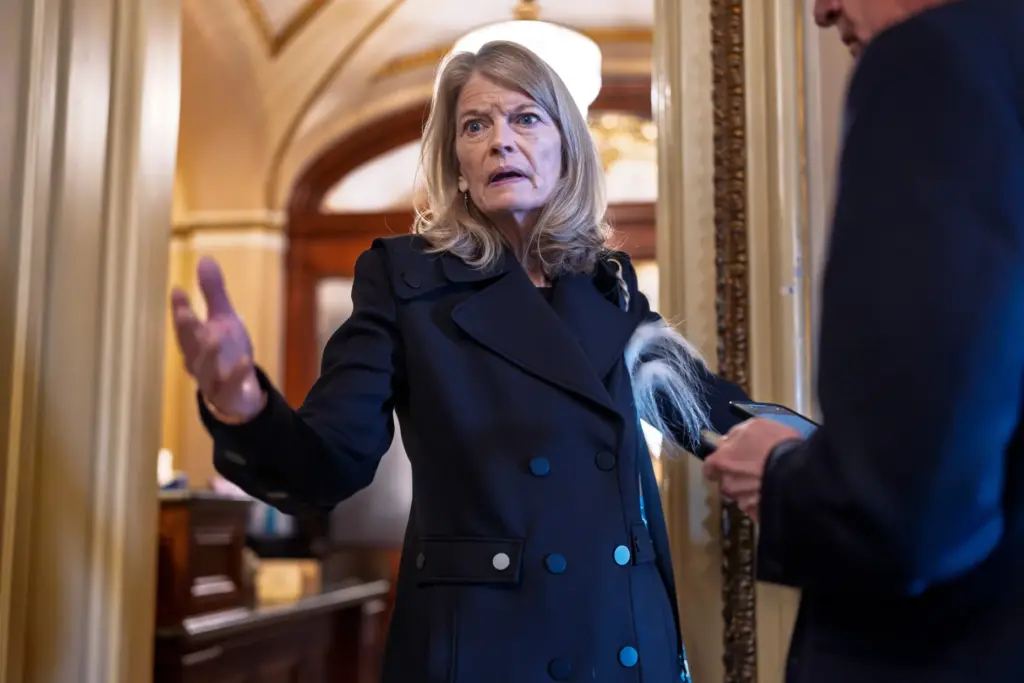 Sen. Lisa Murkowski answers a question from a reporter.