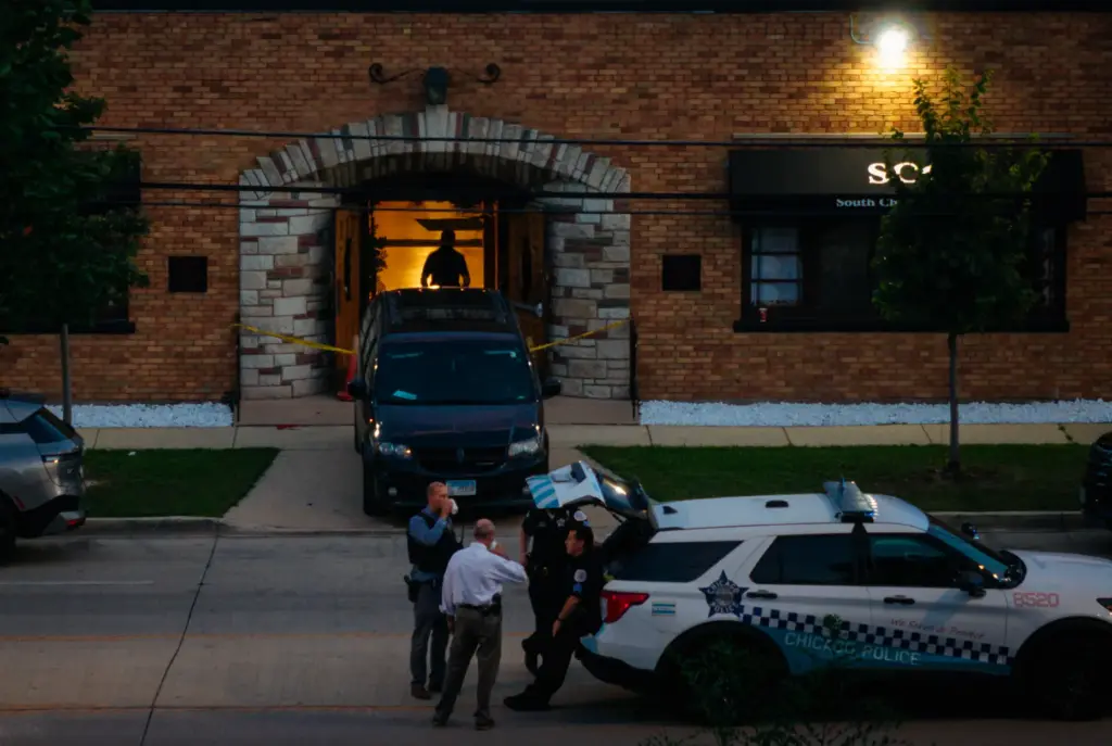 Officials work the scene at South Chicago Chapel funeral home...