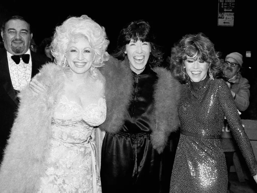 FILE – Dolly Parton, left, Lily Tomlin, center, and Jane...
