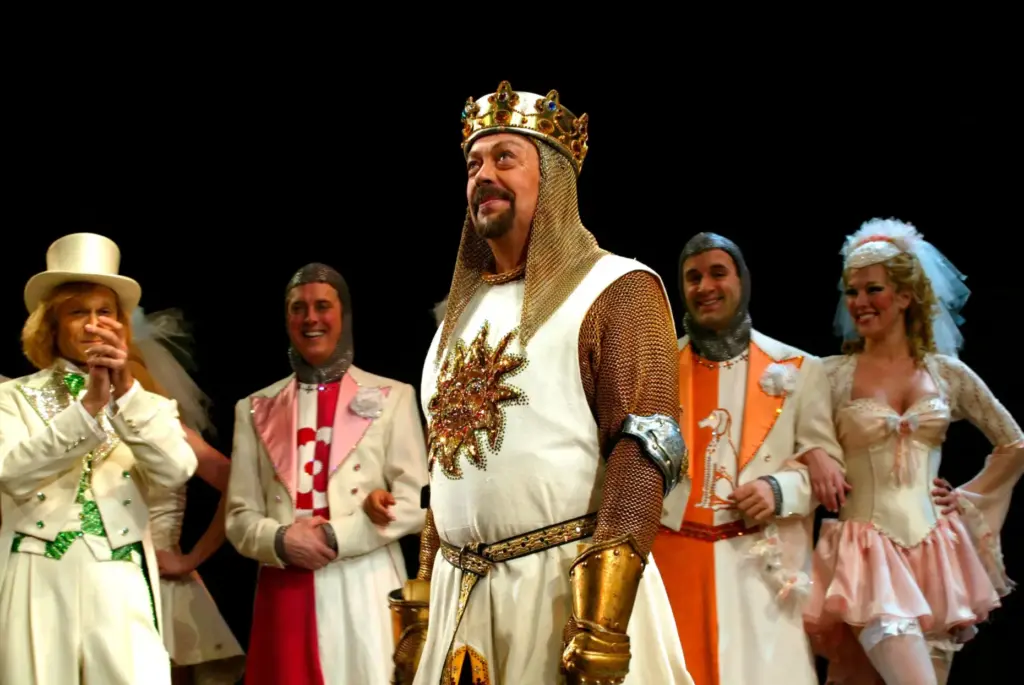 FILE – Tim Curry performs a number from the musical...