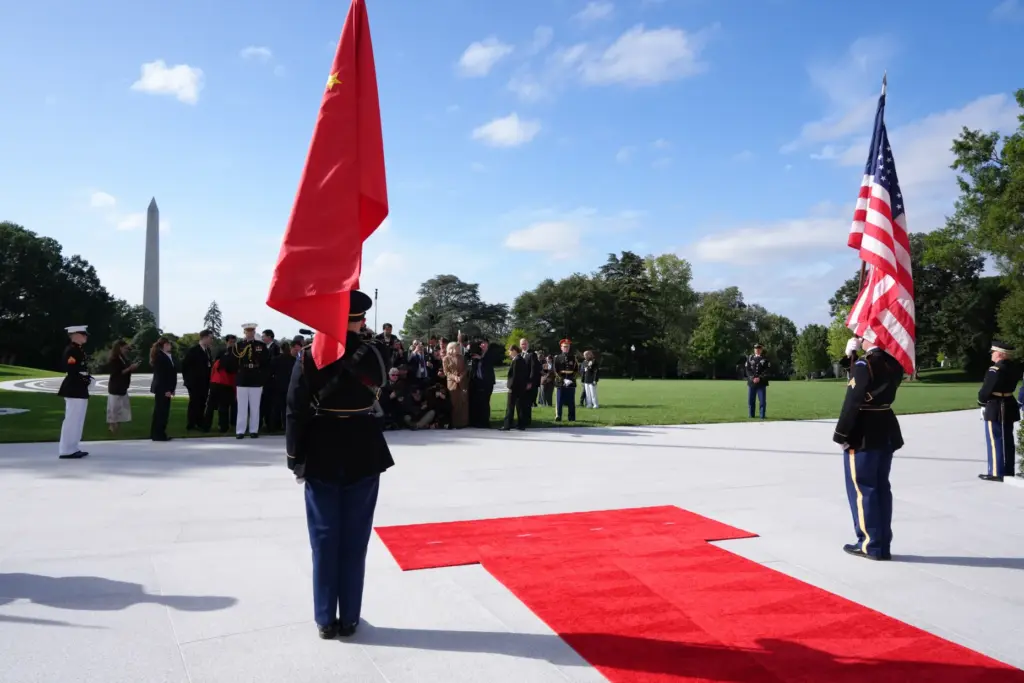 Members of the military take their places before China's President Xi Jinping arrives.