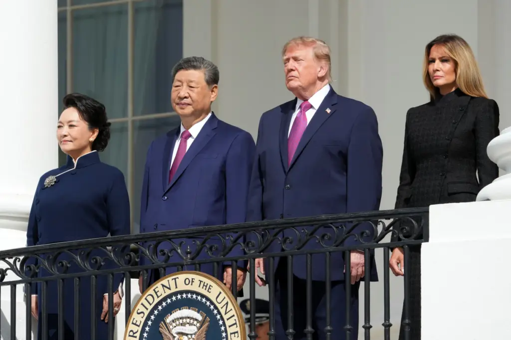 President Donald Trump, center right, first lady Melania Trump, right,...