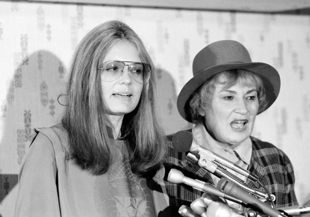 Gloria Steinem and Bella Abzug answer questions during a news conference.