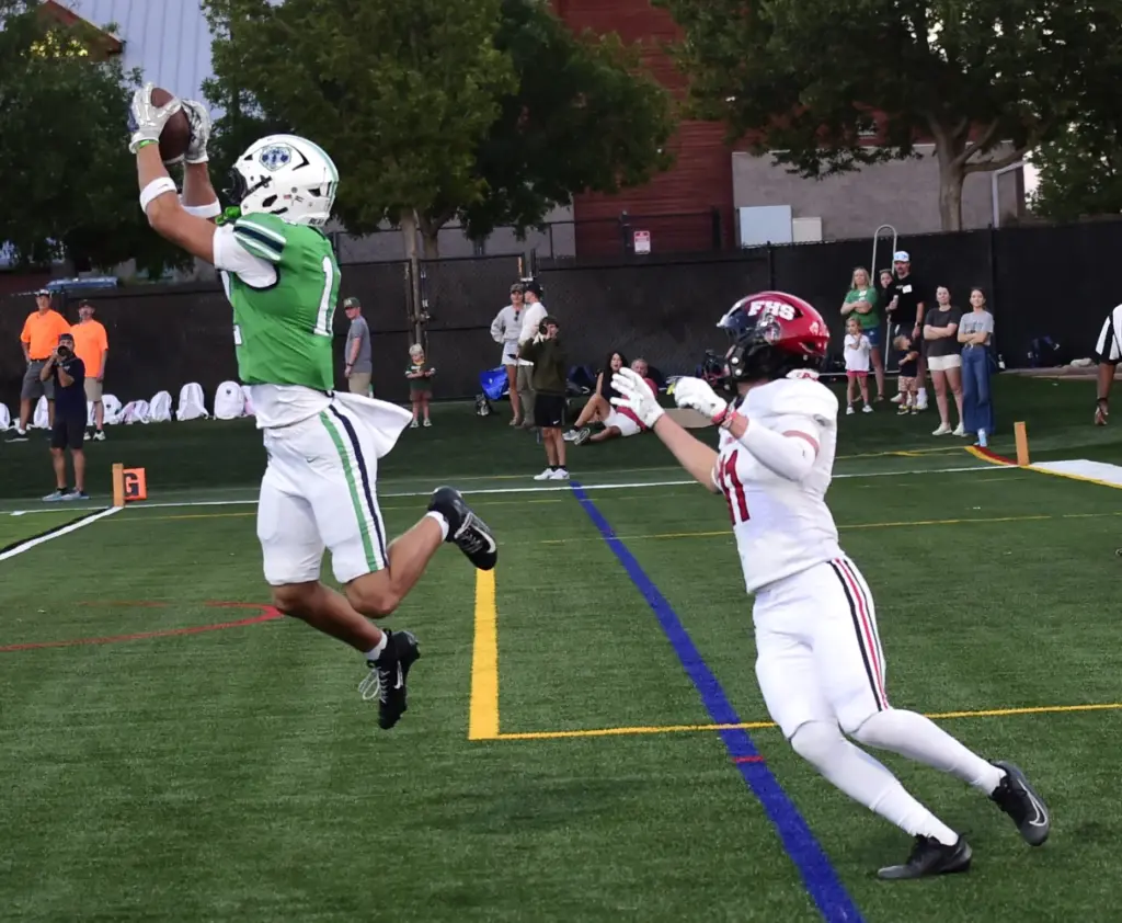 HIGHLANDS RANCH: ThundeRidge’s Brennan Dopke with the interception against Fairview...