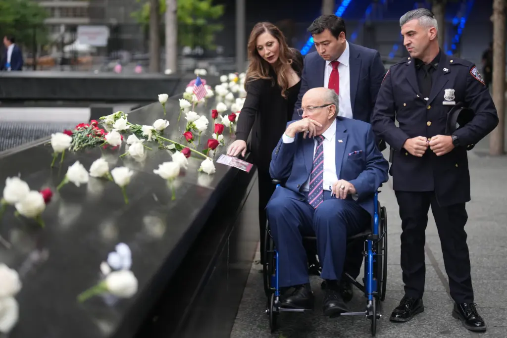 Former New York mayor Rudy Giuliani observes the memorial on the 25th anniversary of 9/11.