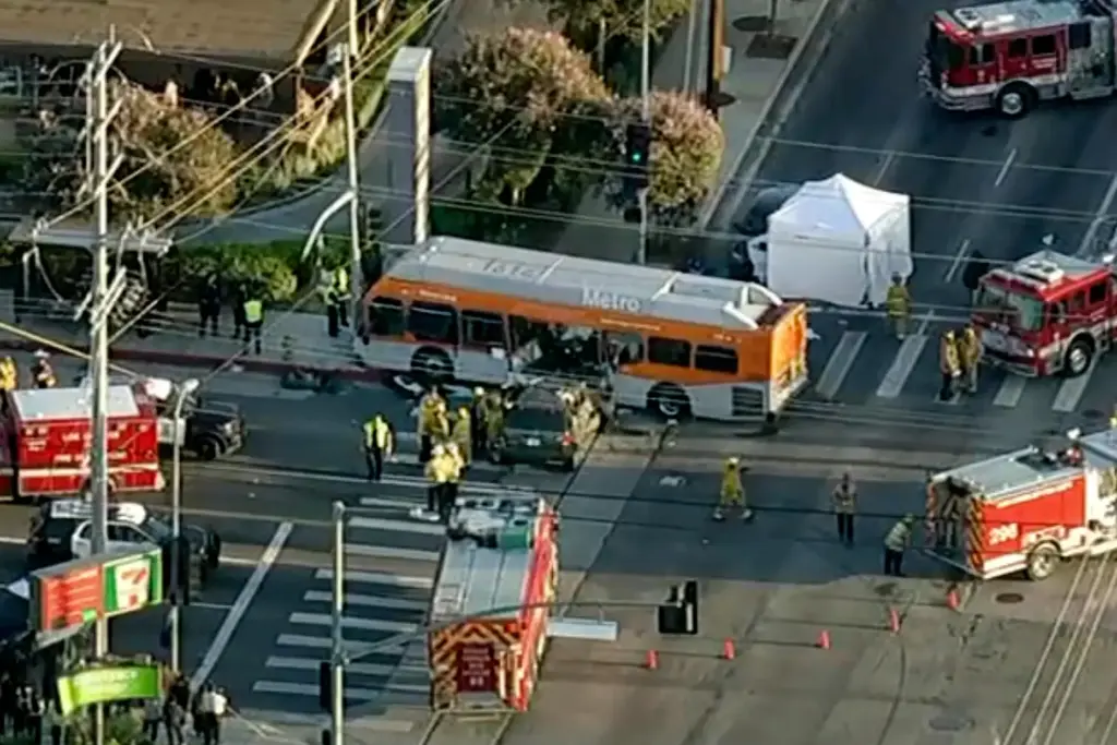 Firefighters respond to a deadly bus crash.
