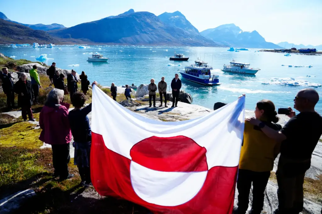 FILE – Denmark’s Prime Minister Mette Frederiksen, Greenland’s government leader...