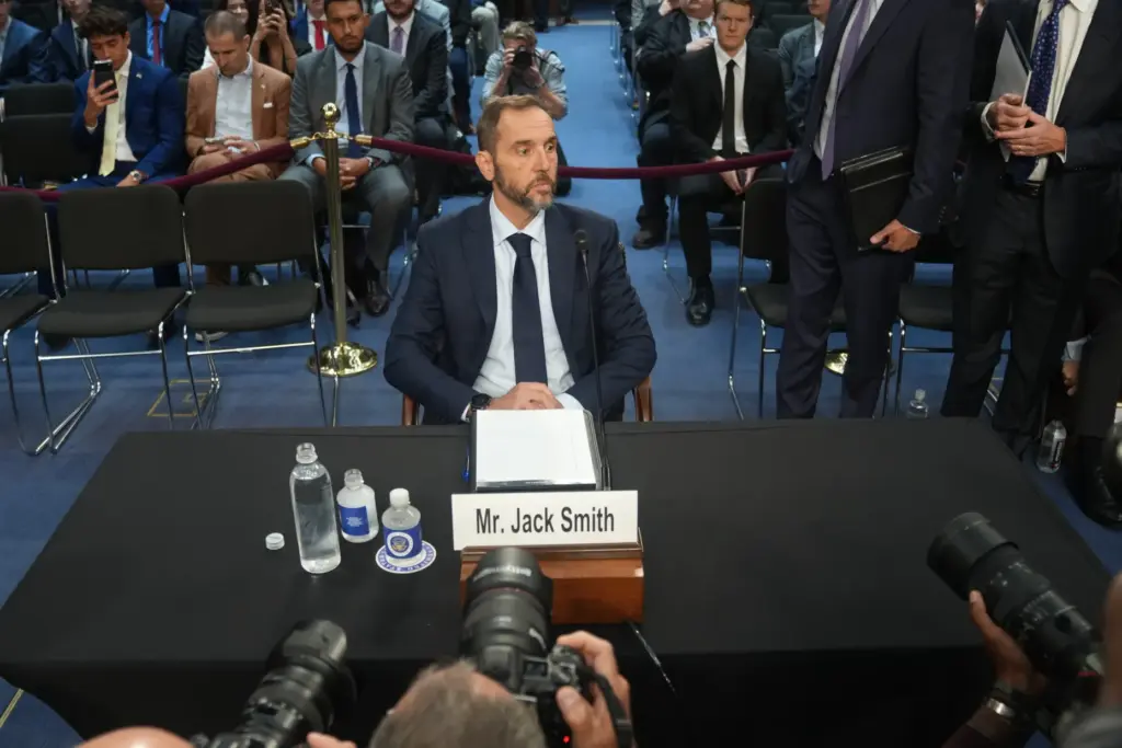 Former Justice Department special counsel Jack Smith is seated before he testifies.