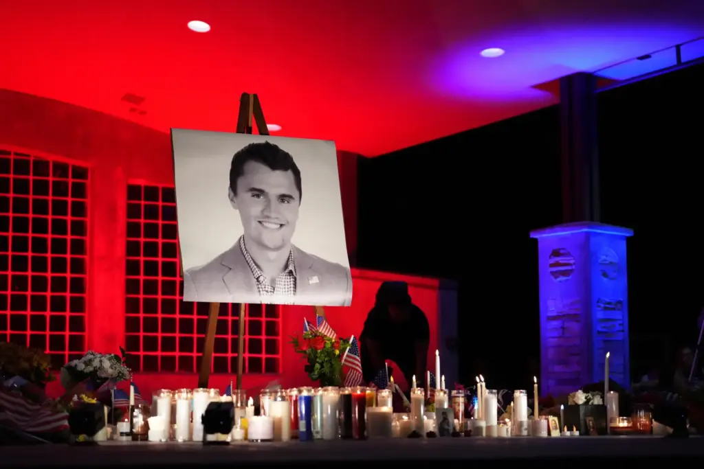 A photo of Charlie Kirk stands at his vigil.
