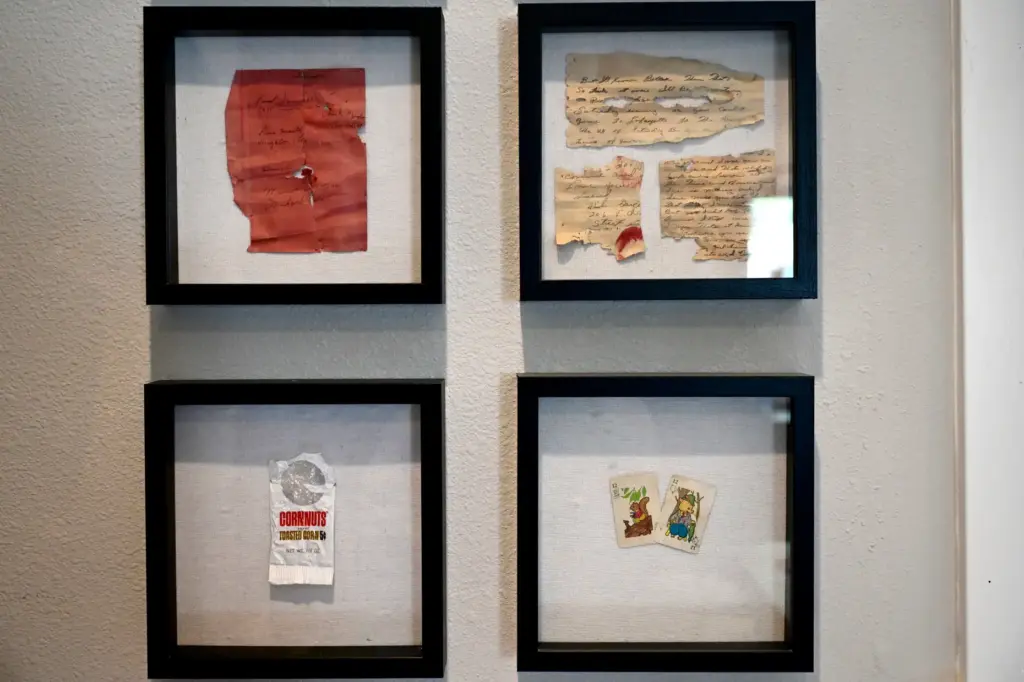 Old artifacts are framed at Lauren Kelley’s home in Lafayette....