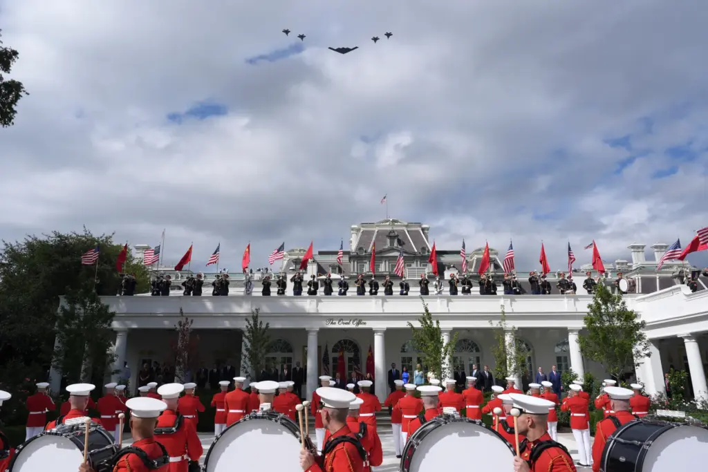 A military flyover is pictured as President Donald Trump, first...