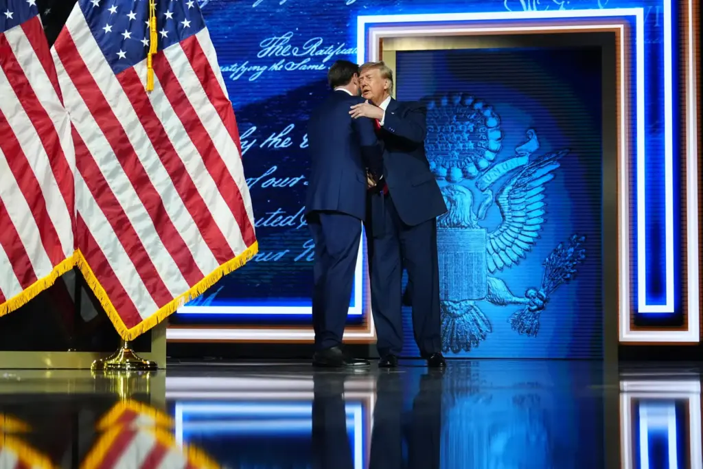 Vice President JD Vance greets President Donald Trump as he arrives at the Republican convention.