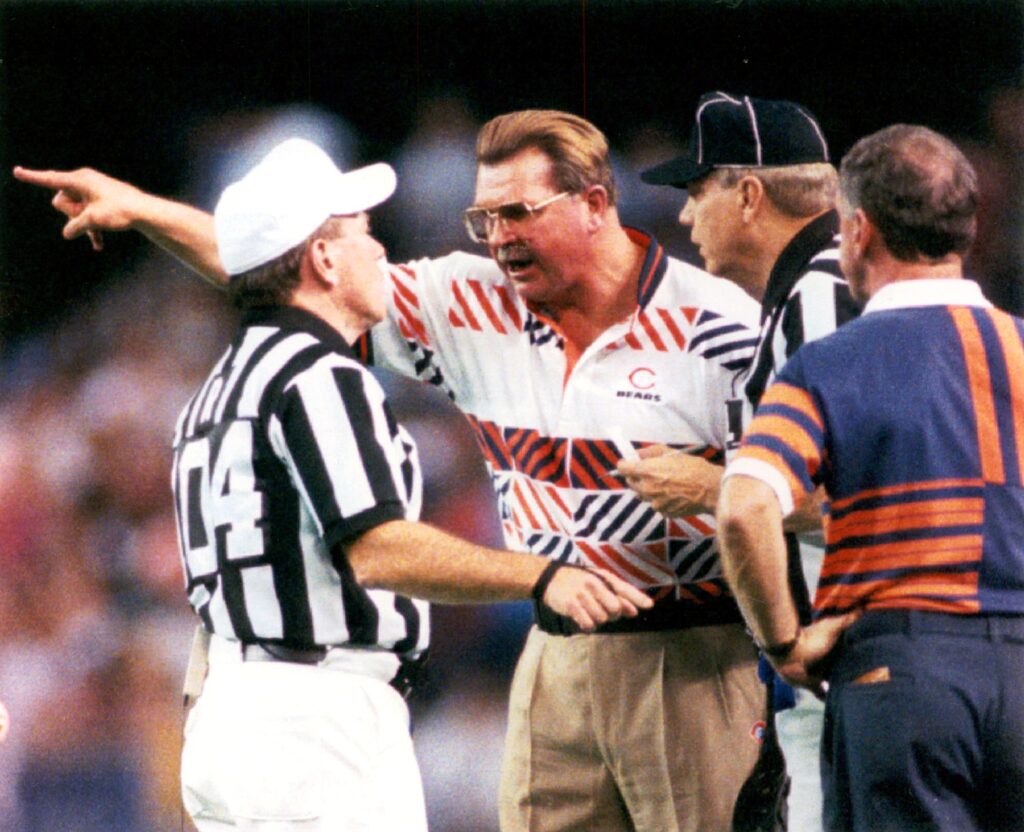 Bears coach Mike Ditka argues a face mask call in...